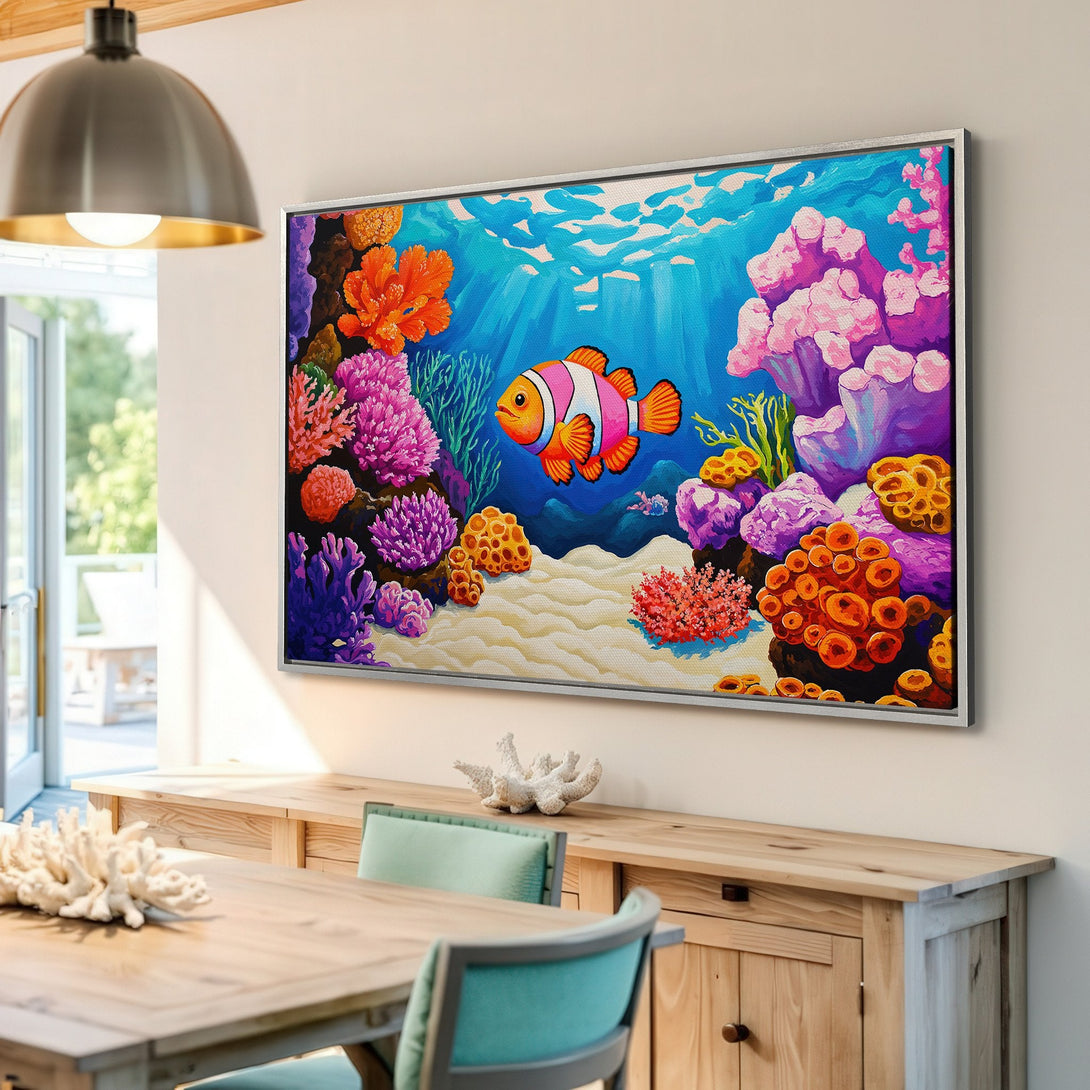 Framed Wall Art: Vibrant underwater scene Canvas Print featuring a clownfish, colorful coral reef, and a bright blue palette. Bring the ocean to your home!