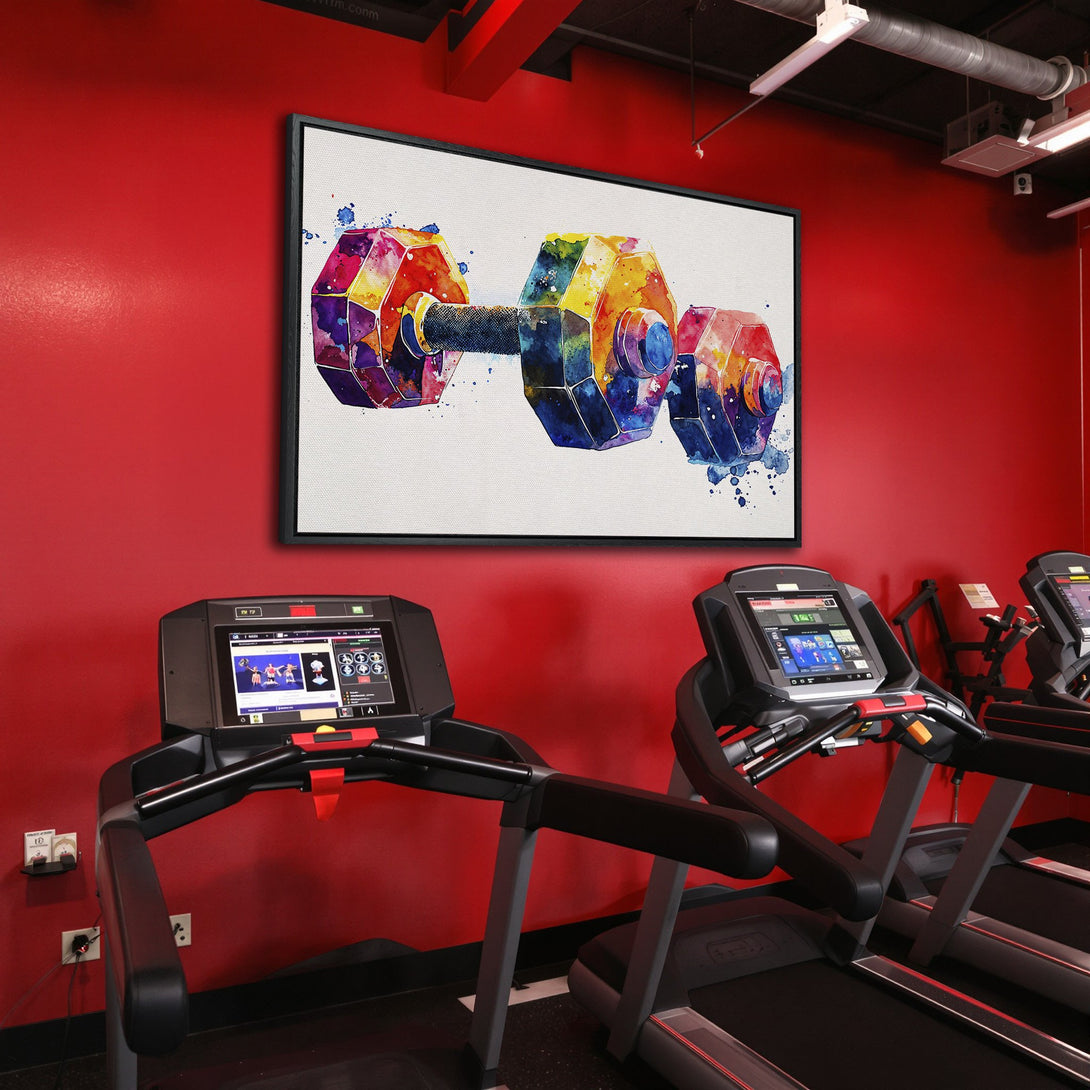 Framed Wall Art: Colorful watercolor dumbbell art in a gym setting. Vibrant rainbow hues pop against the red wall. Perfect fitness decor!