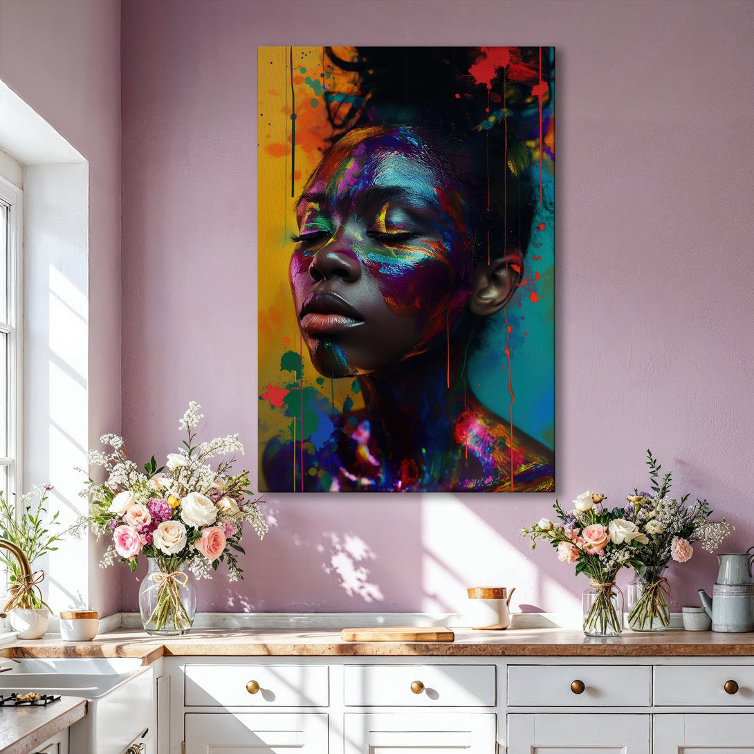 Framed Wall Art featuring a vibrant portrait of a woman with colorful paint splatters. Modern art with a bold, multi-color palette. Enhance your home decor!
