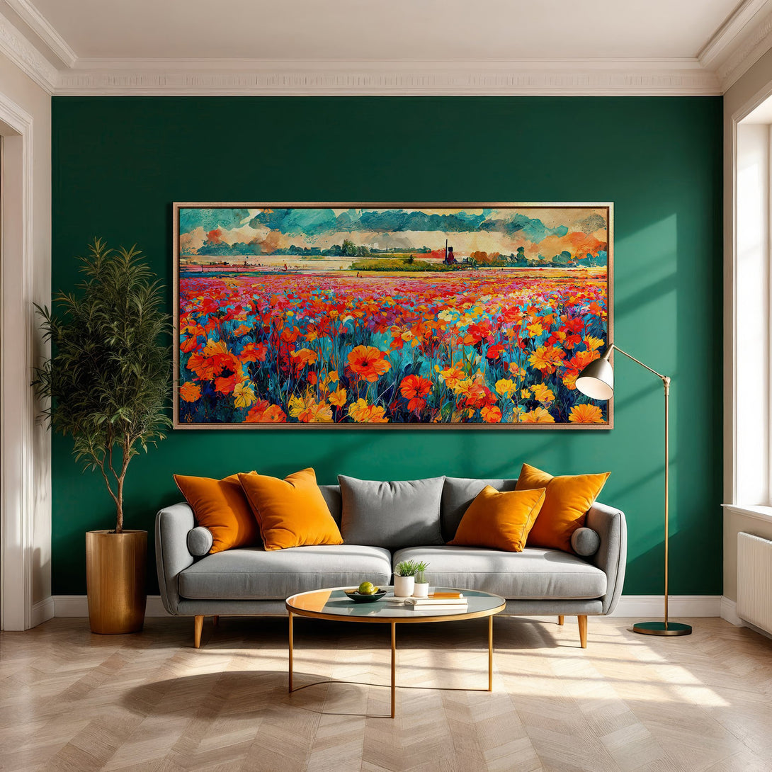 Framed Wall Art: Vibrant floral field painting with warm reds, oranges, and yellows, displayed in a modern living room with green walls. Bring nature indoors!