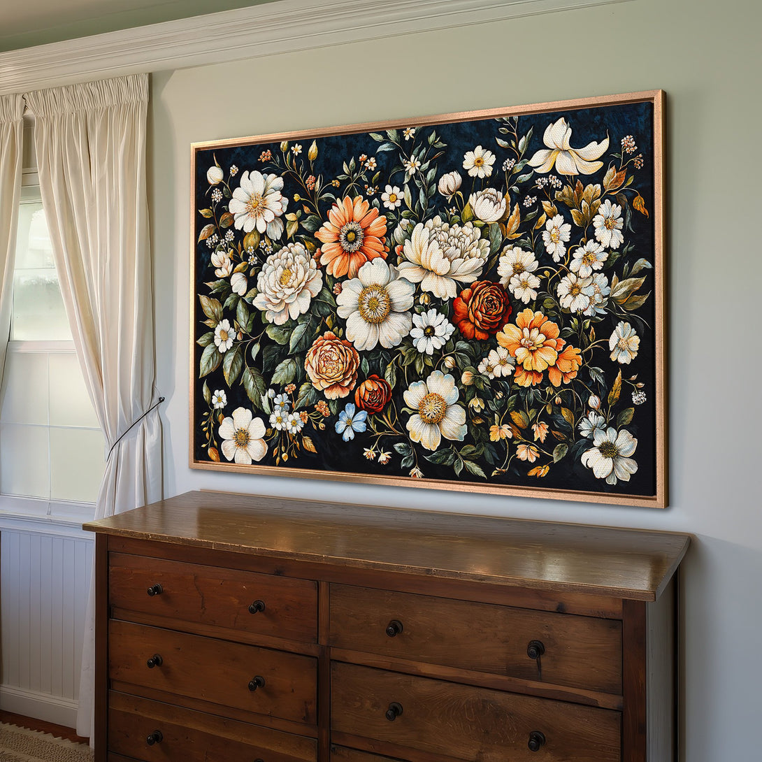 Framed Wall Art: Floral Canvas Print with a dark background, featuring white, orange, and yellow flowers. Perfect for adding elegance to your home decor.