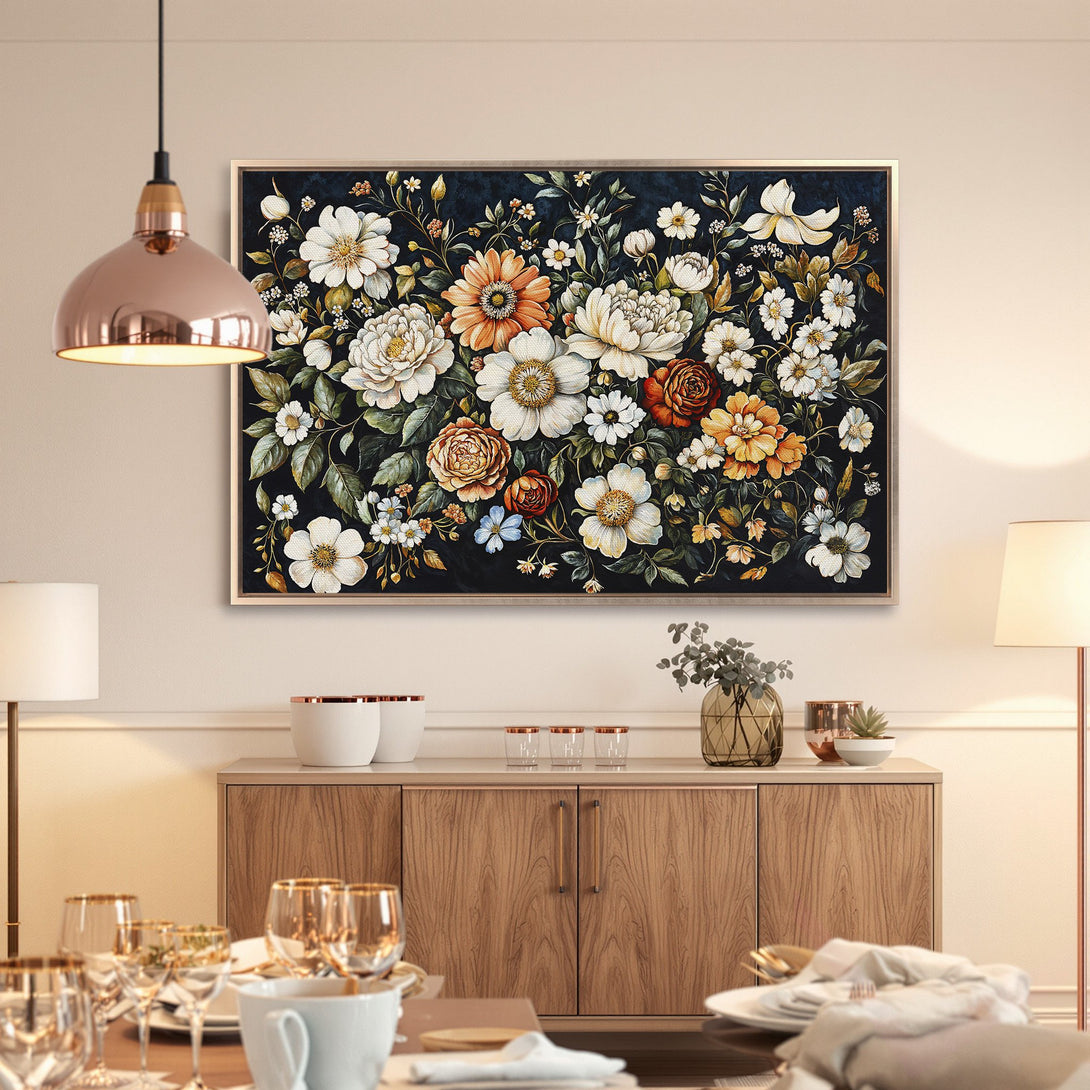 Framed Wall Art: Floral canvas print with a dark background, featuring white, orange, and green flowers. Perfect for adding a touch of elegance to your space.