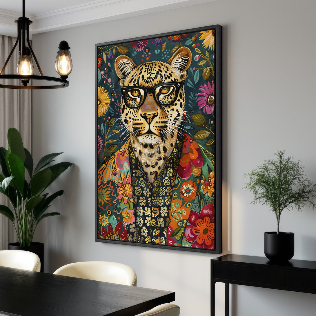 Framed Wall Art featuring a stylish leopard in glasses. Vibrant floral design with a dark teal and warm color palette. Perfect for adding personality to any space!