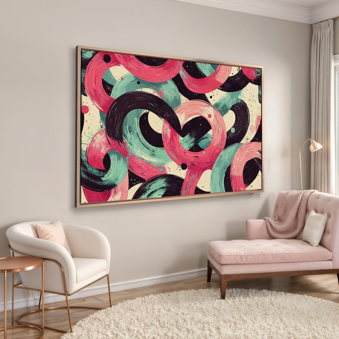 Framed Wall Art featuring abstract brushstroke circles in pink, teal, and black. Modern art for your living room.