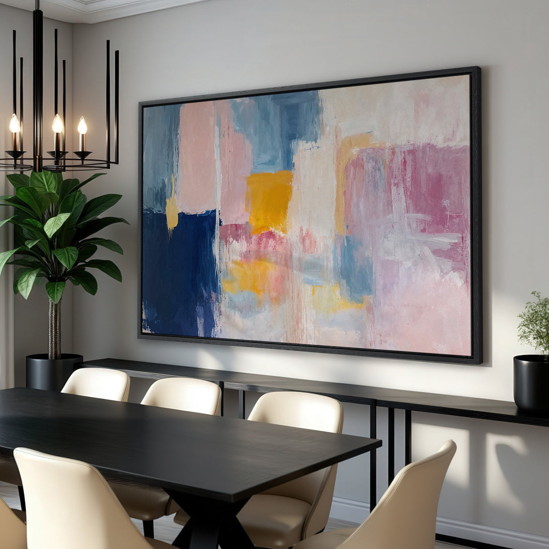 Framed Wall Art: Abstract canvas print with a colorful palette of blues, pinks, and yellows. Modern art for home decor, perfect for dining room or living room.