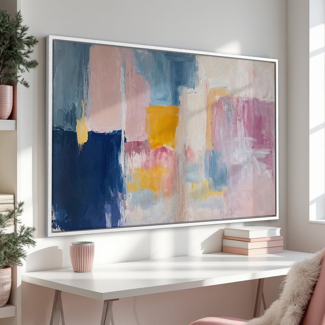 Abstract Canvas Print in a modern interior. Features a colorful palette of blues, pinks, and yellows. Perfect for adding a pop of art to any space.