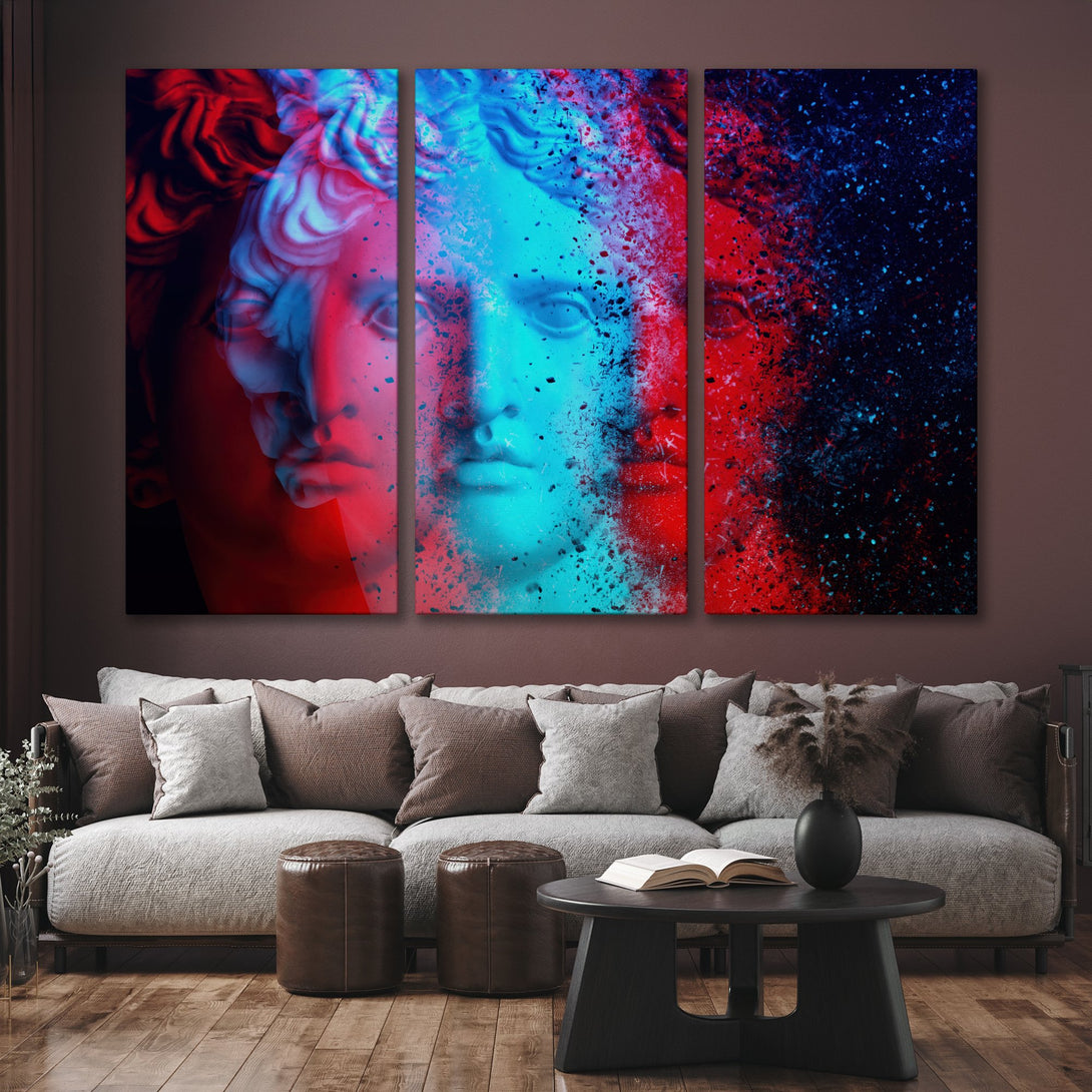 Canvas Print of a neoclassical bust in vibrant red and blue hues, displayed in a modern living room with a brown color palette.