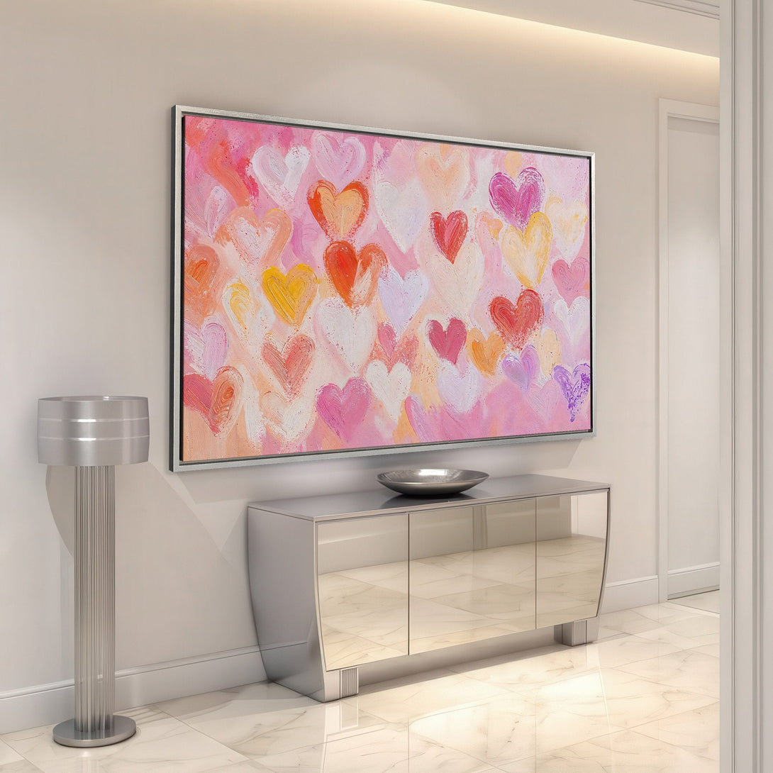 Framed Wall Art featuring a vibrant heart-themed abstract painting in pink, orange, and red hues. Perfect for adding a pop of color to any space!
