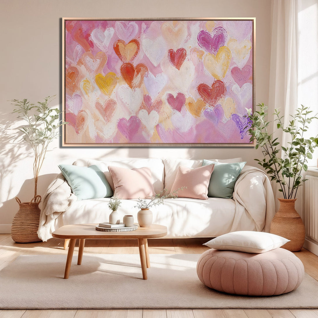 Framed Wall Art featuring a vibrant heart painting. Modern, abstract style with a warm pink, orange, and yellow color palette. Perfect for adding love to your home!