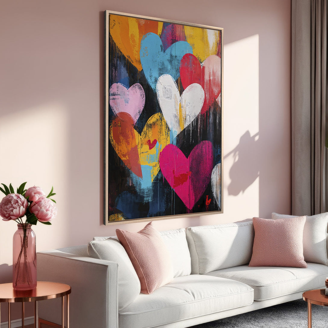 Framed Wall Art: Abstract heart painting with vibrant colors, perfect for adding a pop of art to your living room. Modern style with pink, blue, and yellow hues.