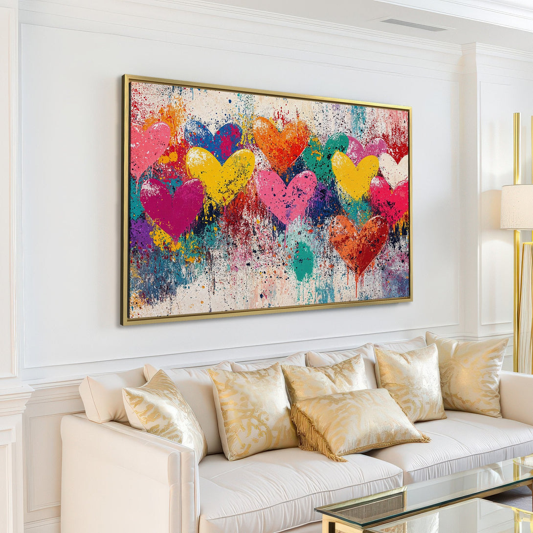 Colorful heart Canvas Print in a modern living room. Abstract art with vibrant reds, yellows, pinks, and blues. Perfect wall decor!