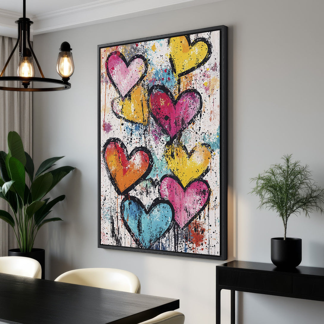 Framed Wall Art featuring colorful abstract hearts. Modern, vibrant canvas print with a playful, expressive style and a bright, mixed color palette. Perfect for adding personality!