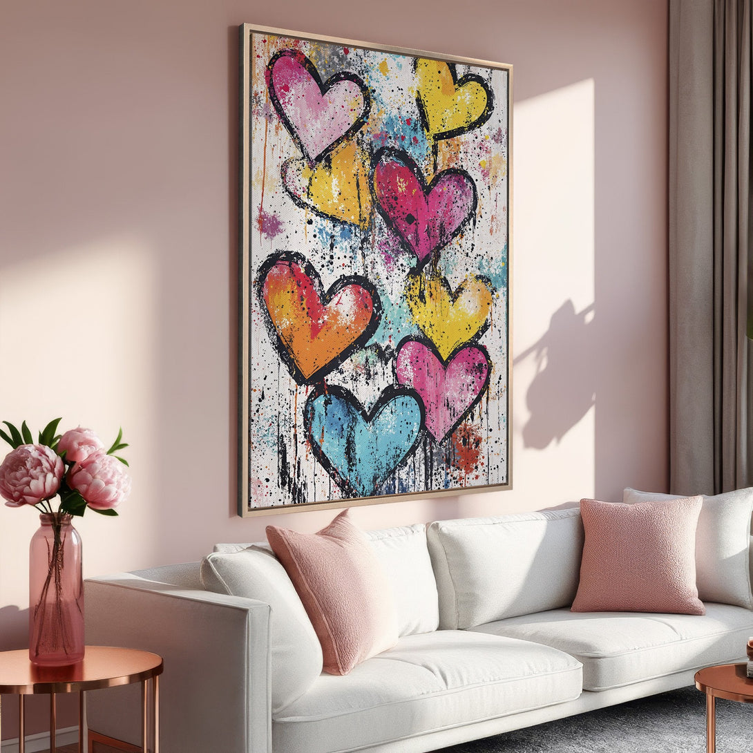 Framed Wall Art featuring colorful abstract hearts in a modern style. Pink, yellow, and blue hues create a vibrant and cheerful aesthetic. Perfect for home decor!