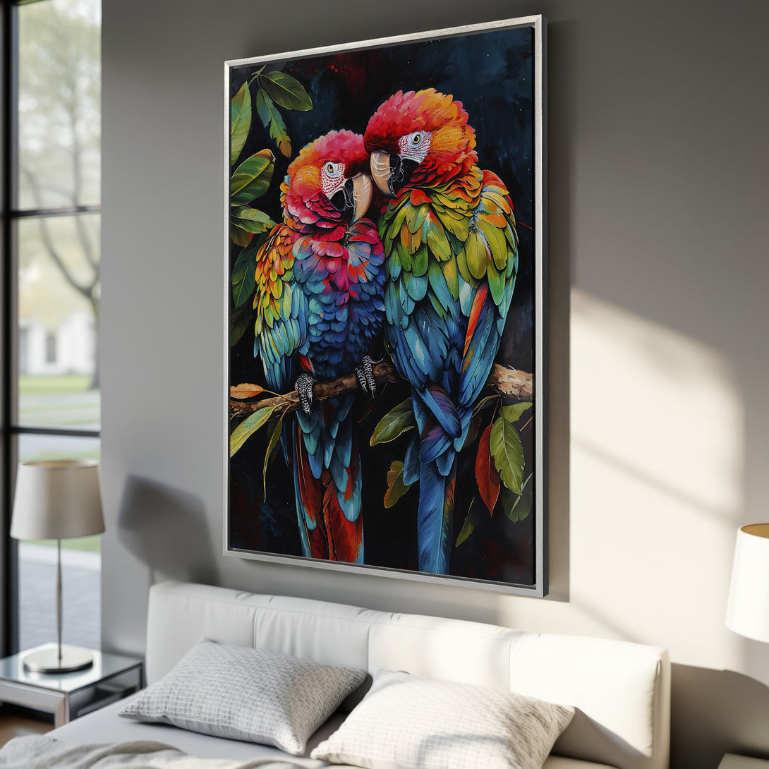 Framed Wall Art featuring vibrant parrots on a branch. Colorful artwork with red, blue, and green hues. Perfect for adding a pop of color to any room.