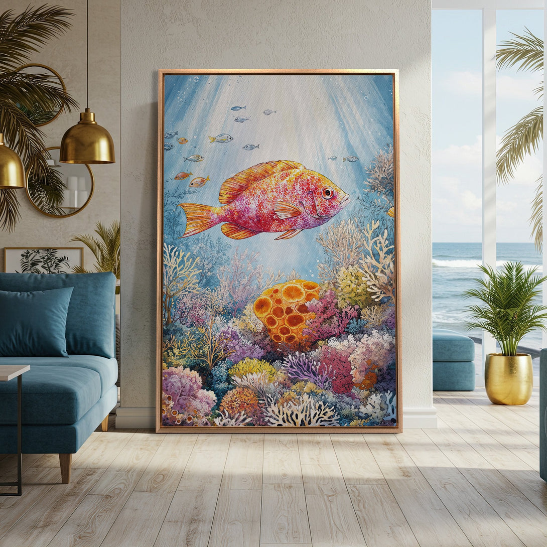 Framed Wall Art featuring a vibrant watercolor painting of a fish and coral reef. Coastal decor in a blue, orange, and purple color palette.