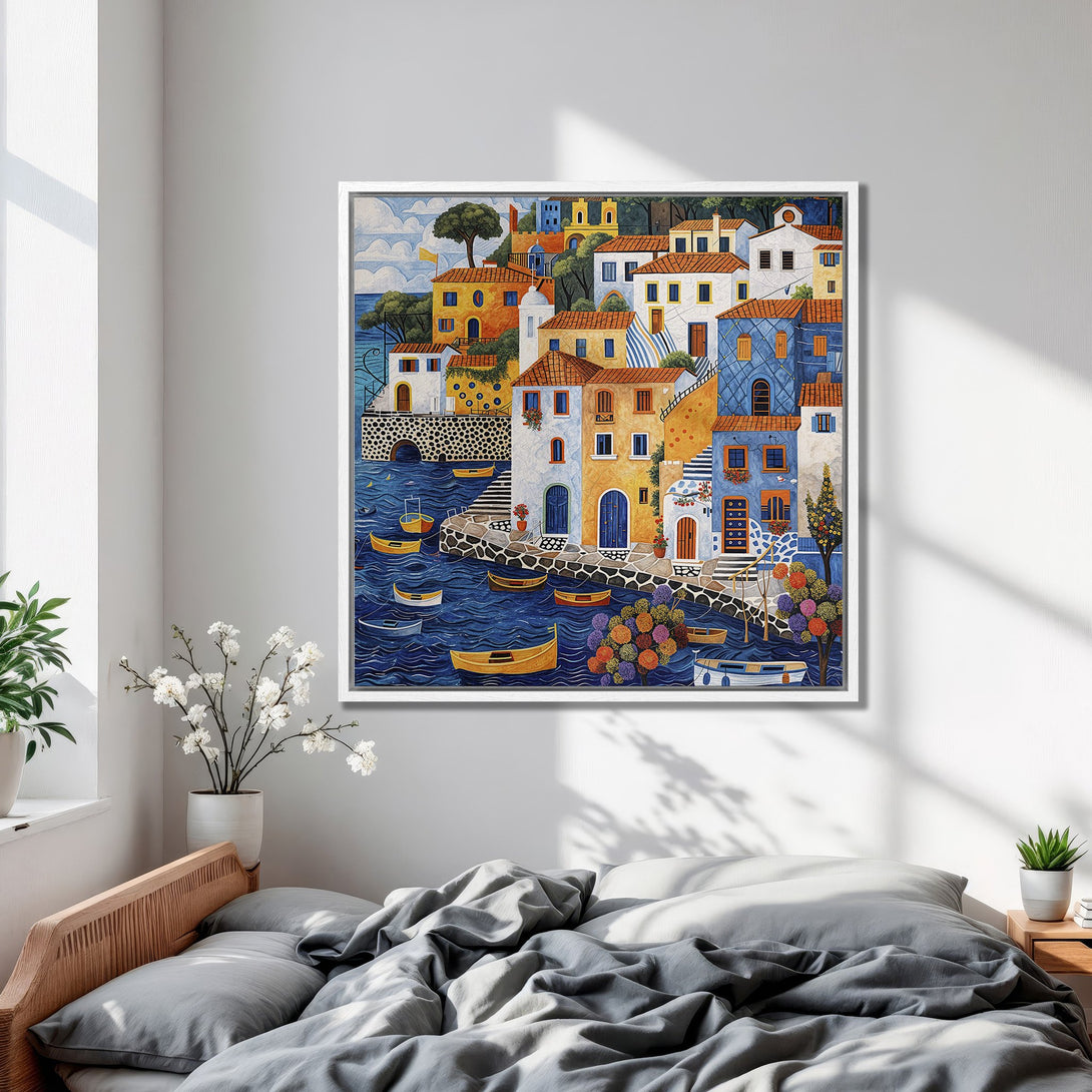 Framed Wall Art of a colorful Mediterranean village scene. Vibrant blues, yellows, and oranges create a sunny, inviting aesthetic. Perfect for coastal decor.