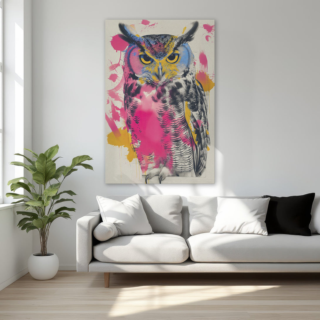 Framed Wall Art: Colorful owl canvas print in a modern style. Features a vibrant pink, yellow, and blue color palette. Perfect for adding a pop of art to your space.