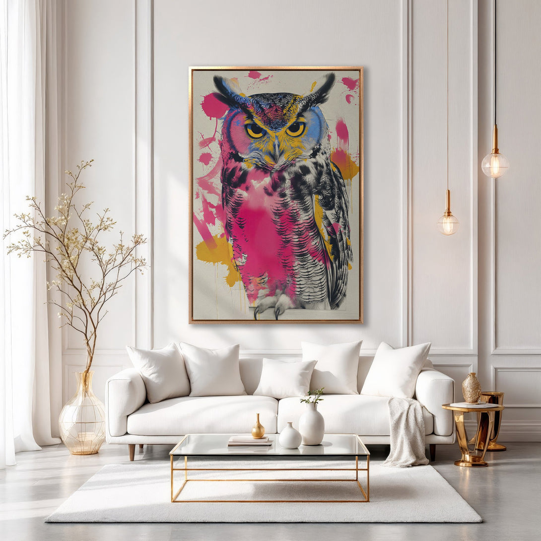 Framed Wall Art: Vibrant owl portrait in a modern living room. Pop art style with pink, yellow, and blue accents. Elevate your space with this stunning canvas print!