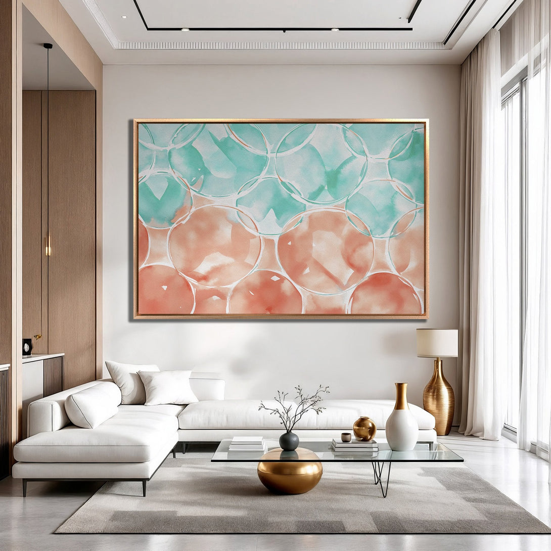 Framed Wall Art featuring an abstract watercolor design in teal and coral, adding a pop of color to a modern living room.