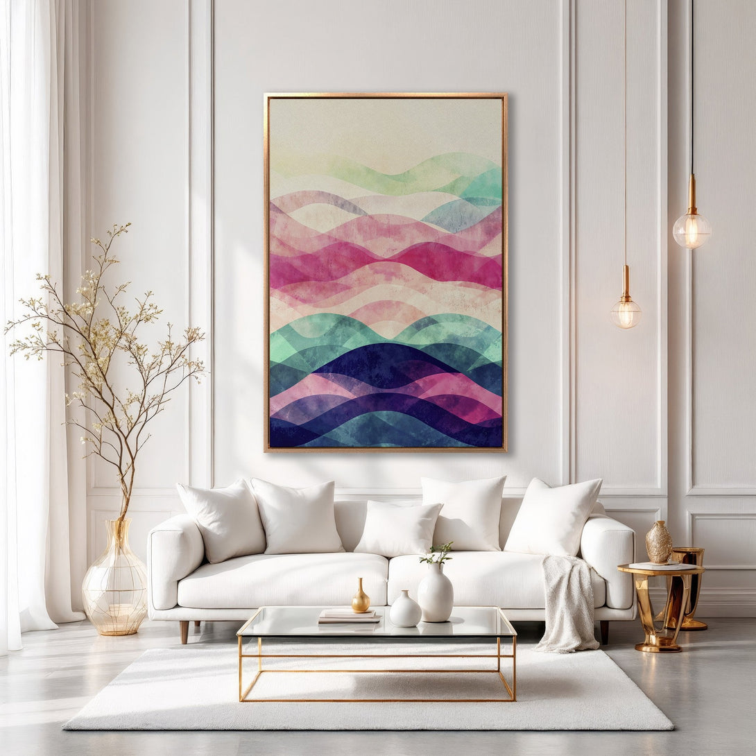 Framed Wall Art: Abstract wave design in vibrant pinks, blues, and greens. Modern canvas print adds a pop of color to any living room.