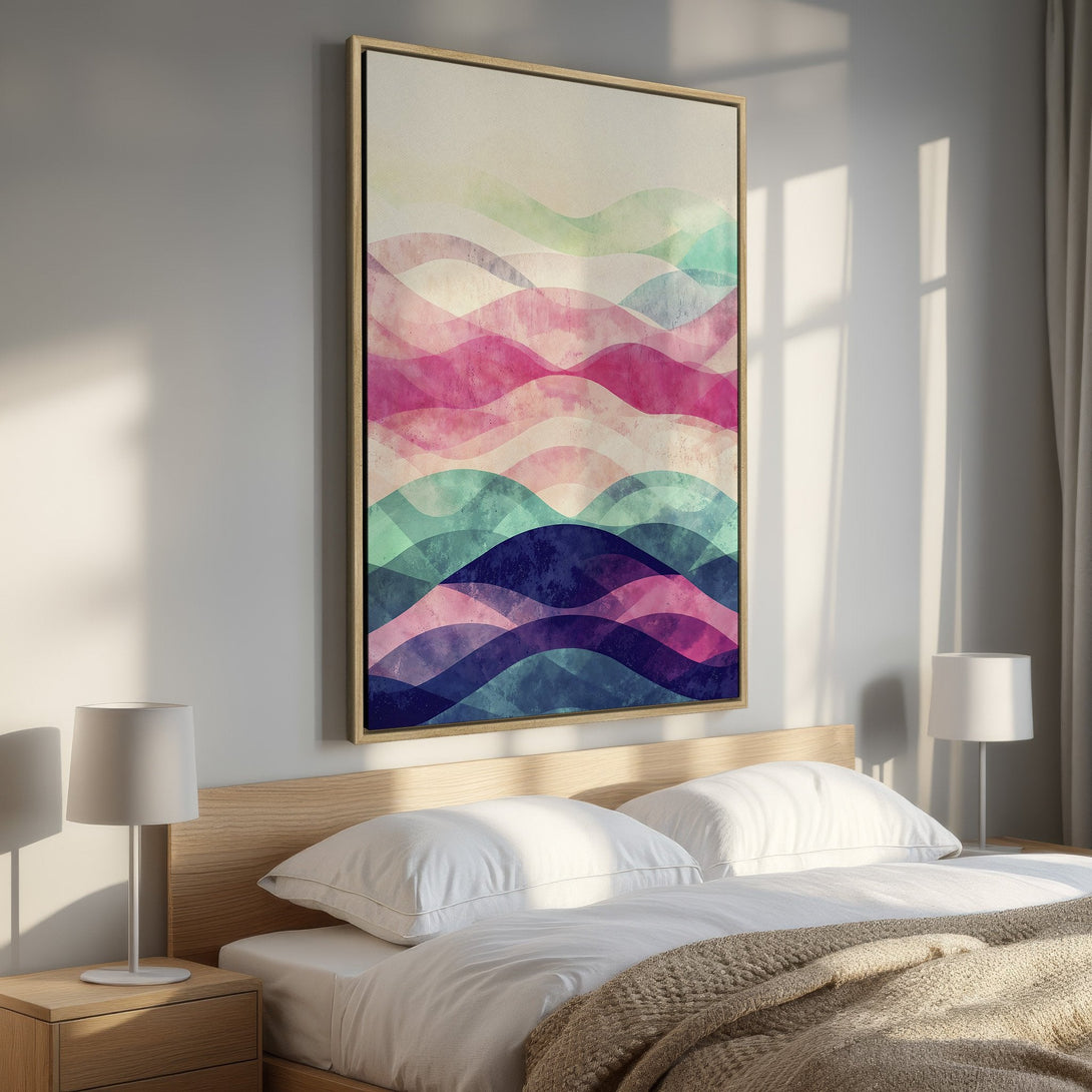 Framed Wall Art featuring abstract watercolor waves in a vibrant pink, teal, and purple color palette. Modern art perfect for bedroom decor.