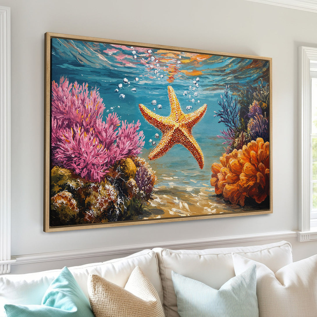 Framed Wall Art: Underwater starfish painting with vibrant coral and blue hues. Coastal decor for a serene living room.