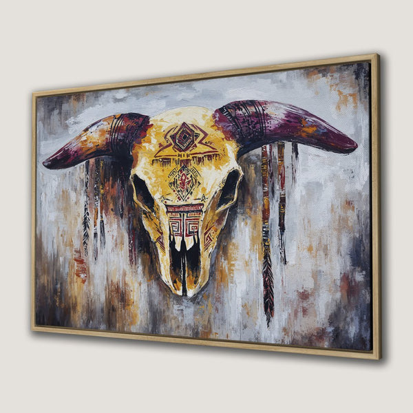 Framed Wall Art: Southwestern-style canvas print featuring a decorated bull skull in warm yellow, brown, and red tones. Perfect for adding a touch of rustic charm.