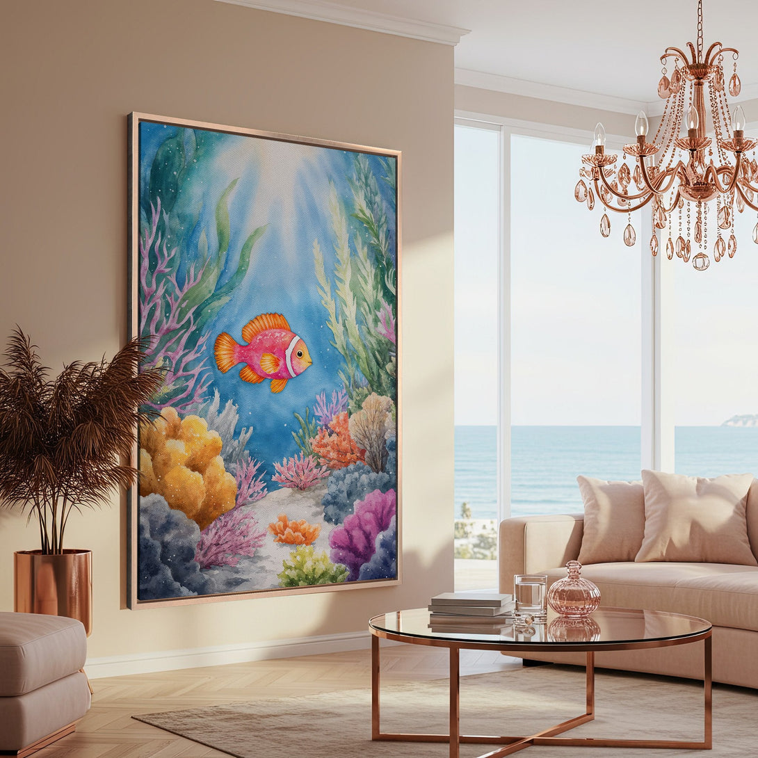 Framed Wall Art: Watercolor painting of a colorful clownfish in an underwater scene. Beautiful blue, pink, and yellow hues create a calming, coastal vibe.