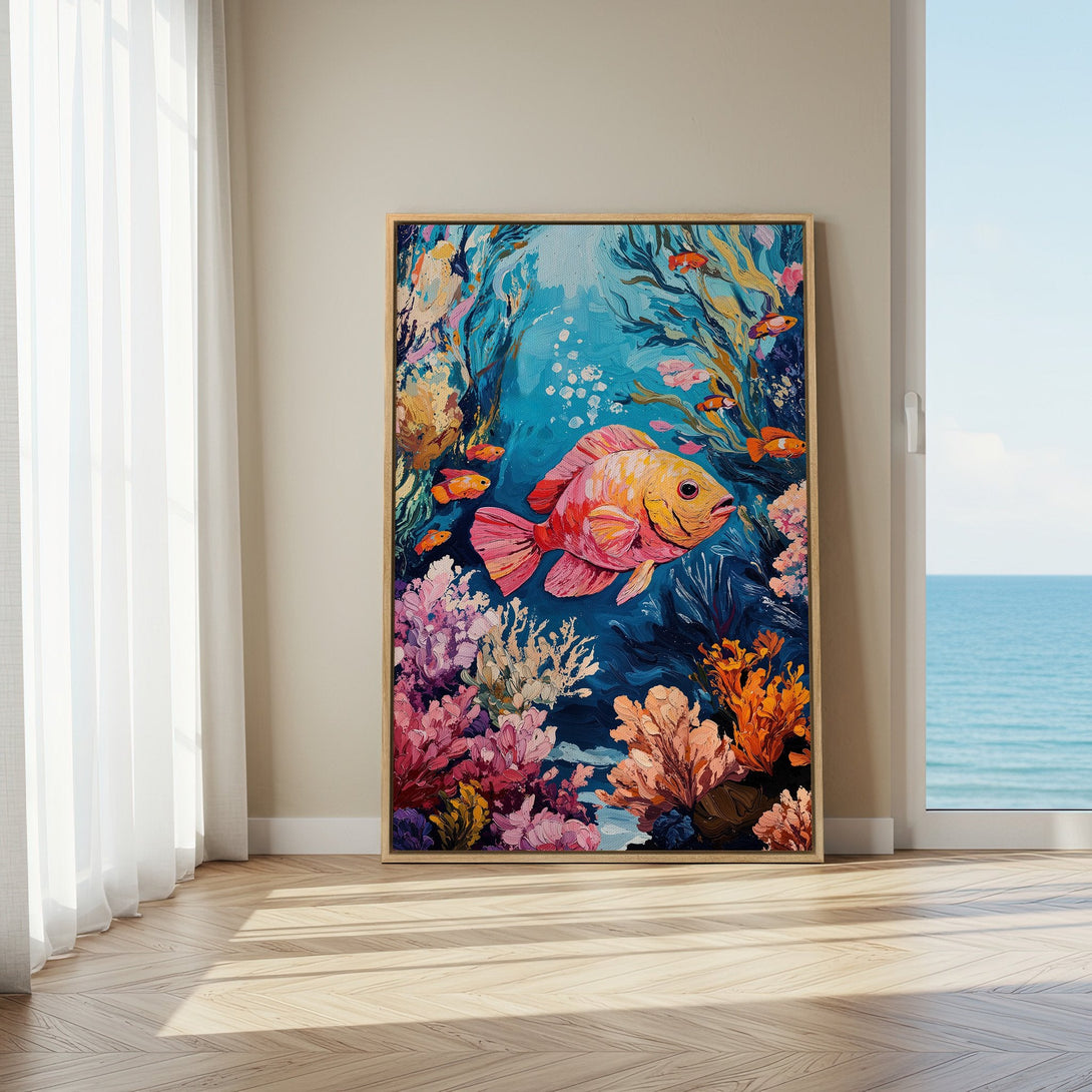 Framed Wall Art: Vibrant fish painting with coral reef in a blue, pink, and orange palette. Perfect for adding a splash of color to your home decor.