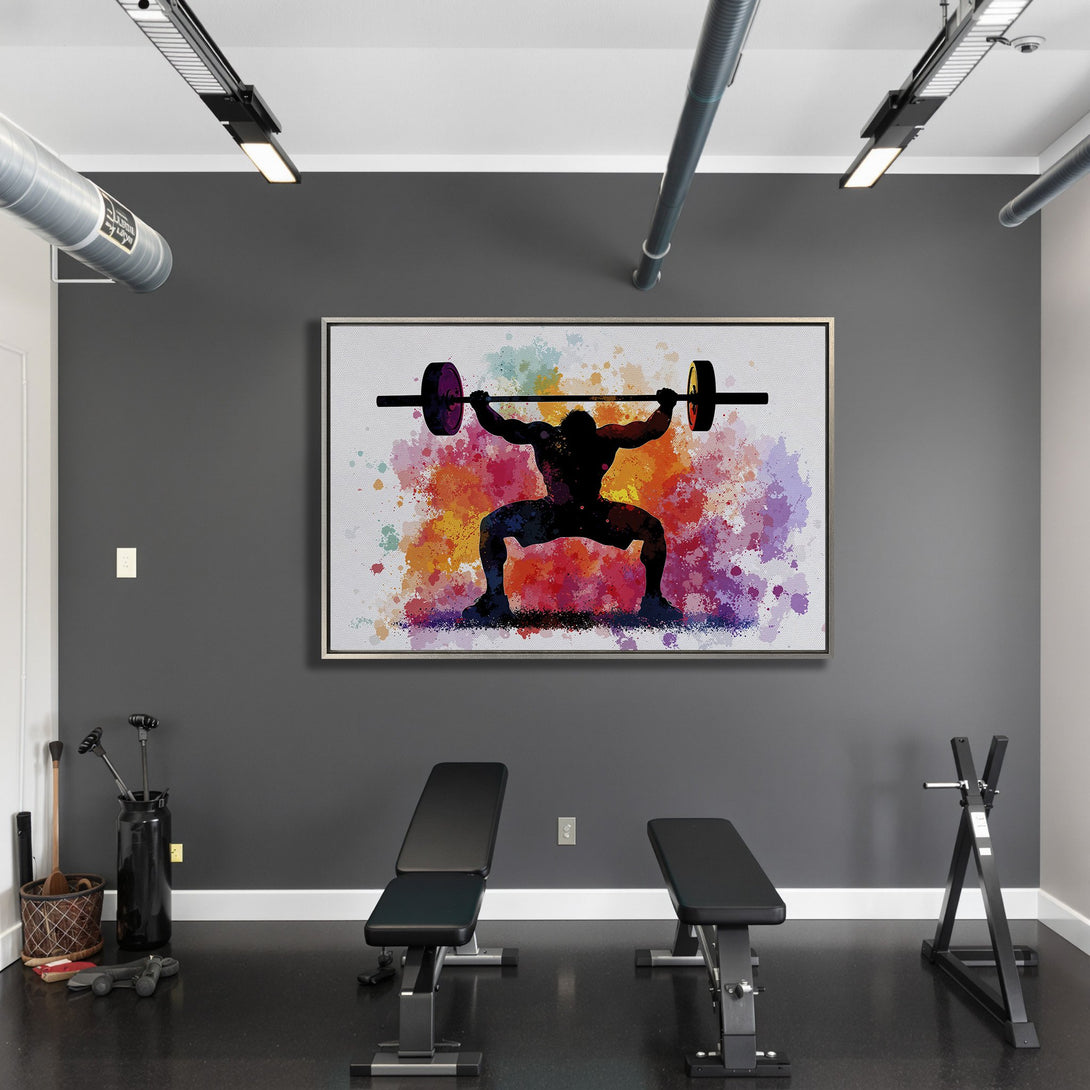 Framed Wall Art: Watercolor weightlifter silhouette in a gym. Vibrant splash of colors (orange, purple, blue) on a white background. Perfect for fitness enthusiasts!