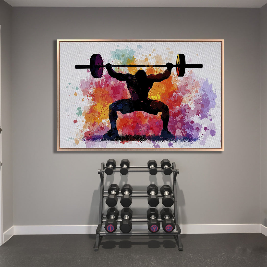 Framed Wall Art: Watercolor weightlifter silhouette with vibrant splashes of color. Perfect for gym decor! Canvas Print with a modern, artistic touch.