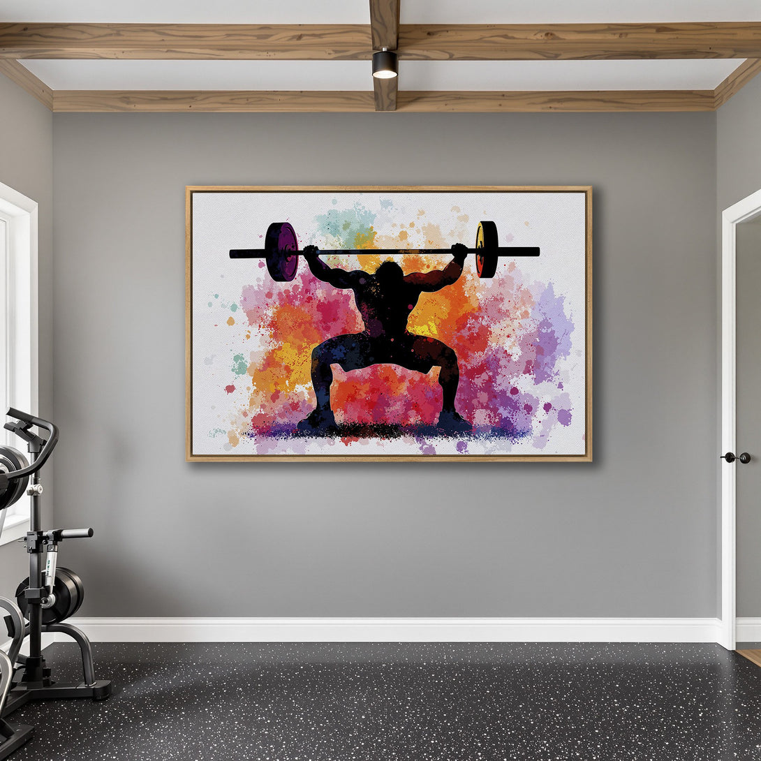 Framed Wall Art of a weightlifter in a watercolor style, featuring a vibrant, colorful splash background. Perfect for home gyms!