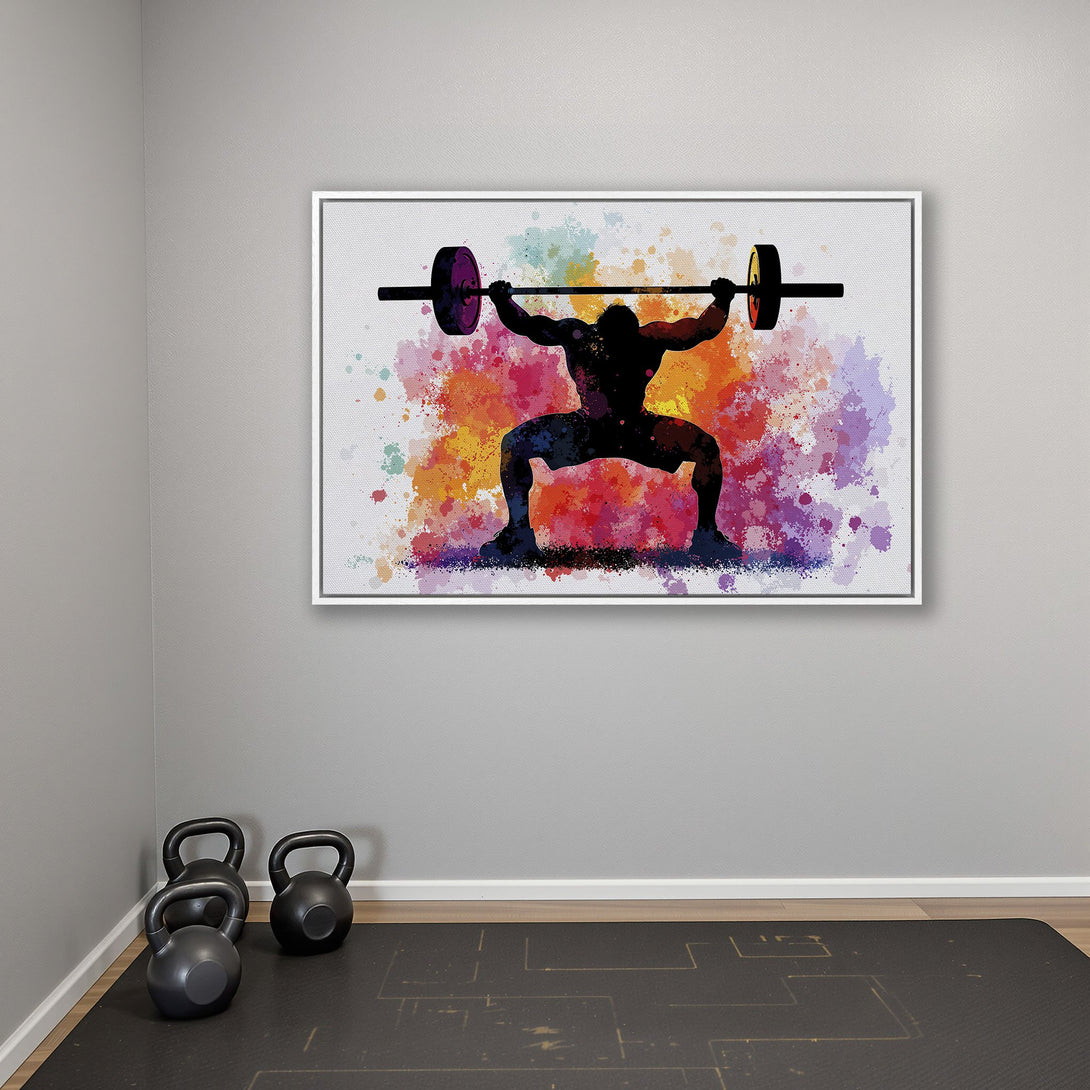 Framed Wall Art: Watercolor silhouette of weightlifter with colorful splash background. Modern fitness decor in vibrant orange, purple, and blue hues.