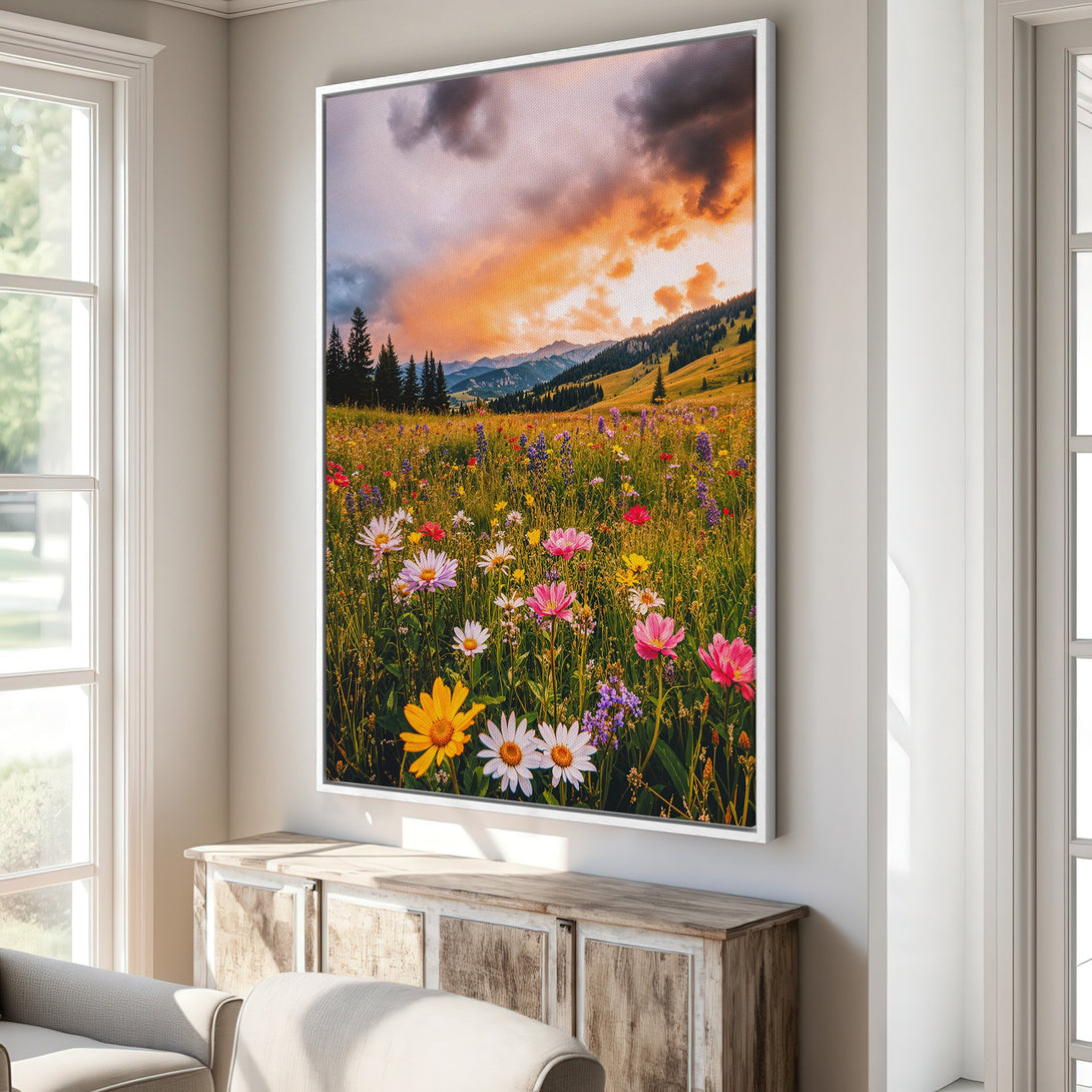 Framed Wall Art of a vibrant wildflower meadow under a sunset sky. Warm, colorful palette with pinks, yellows, and oranges. Perfect for home decor.