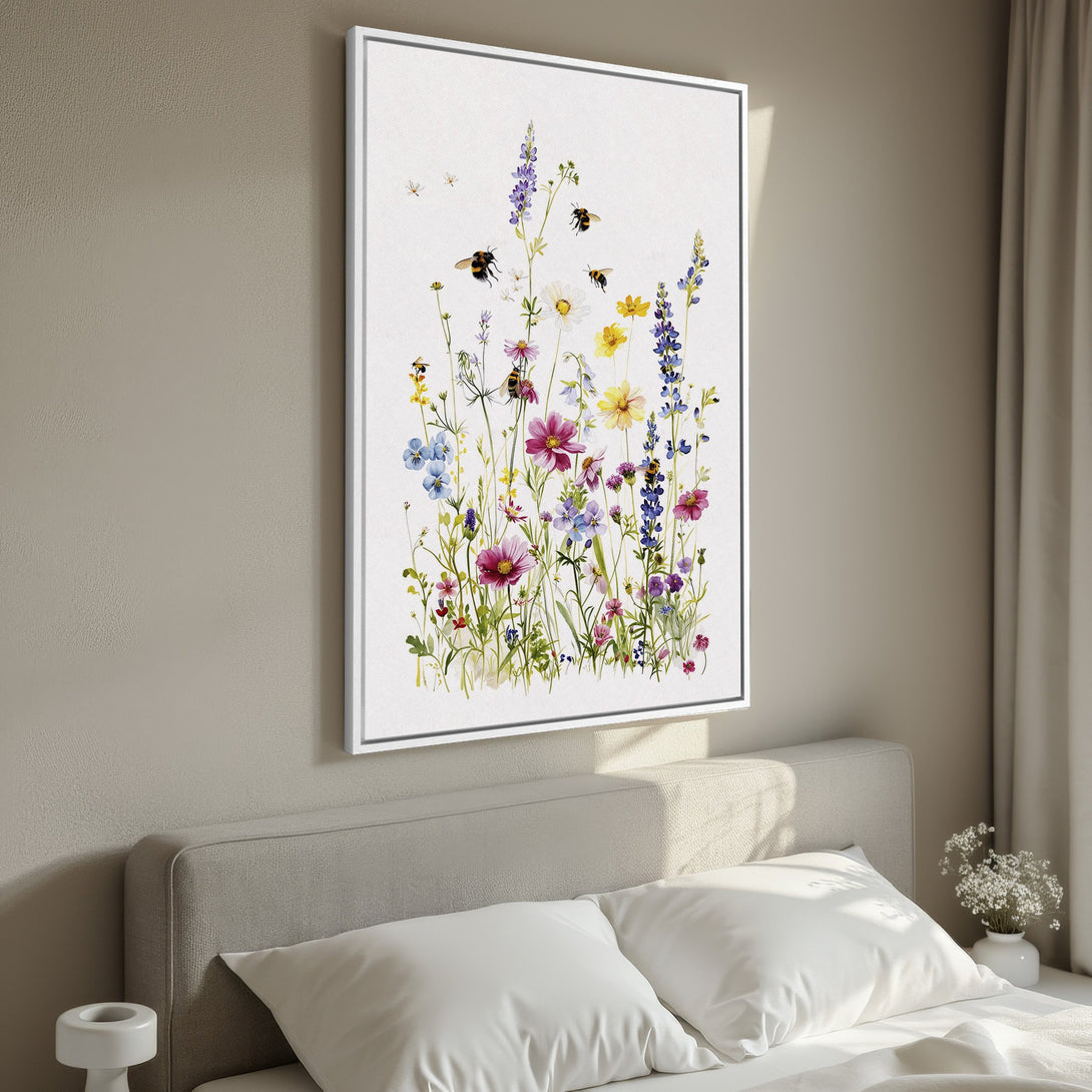 Framed Wall Art featuring a watercolor wildflower meadow with bees. Soft, colorful palette of purples, blues, yellows, and pinks. Perfect bedroom decor.