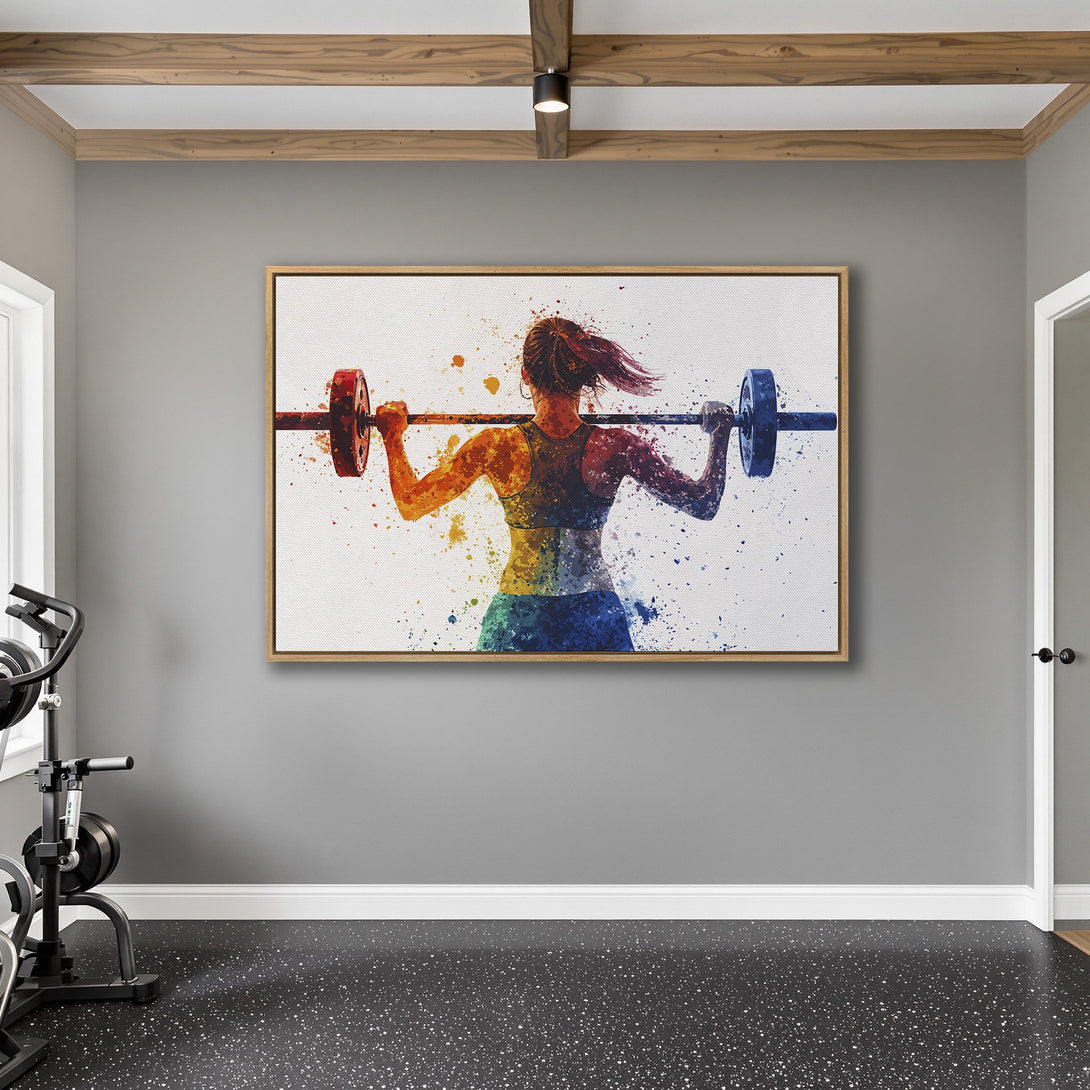 Framed Wall Art: Watercolor painting of a woman lifting weights, vibrant rainbow colors. Perfect for gym decor or motivational art.