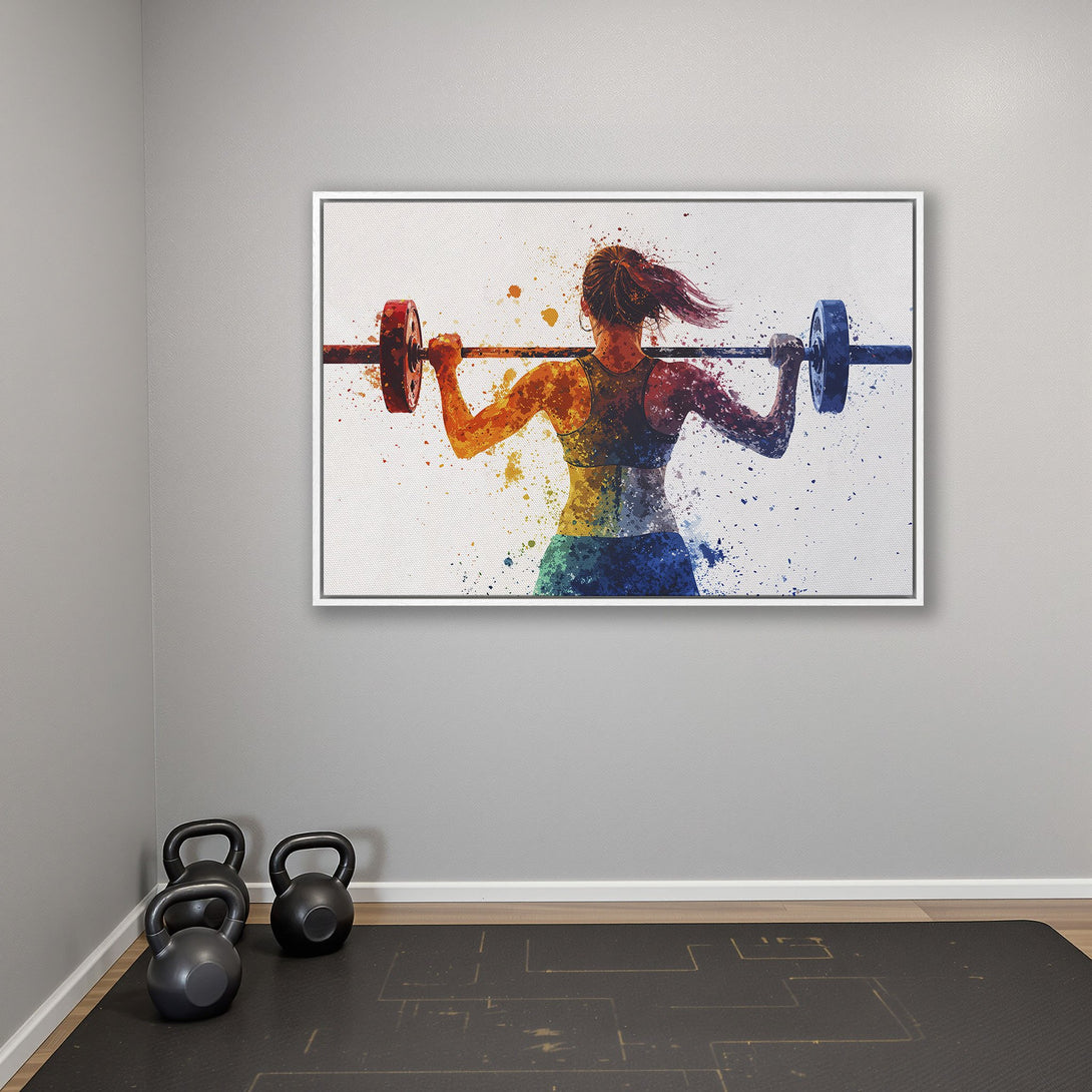 Framed Wall Art: Watercolor canvas print of a woman lifting weights, vibrant orange, yellow, and blue hues. Perfect fitness decor for your home gym!