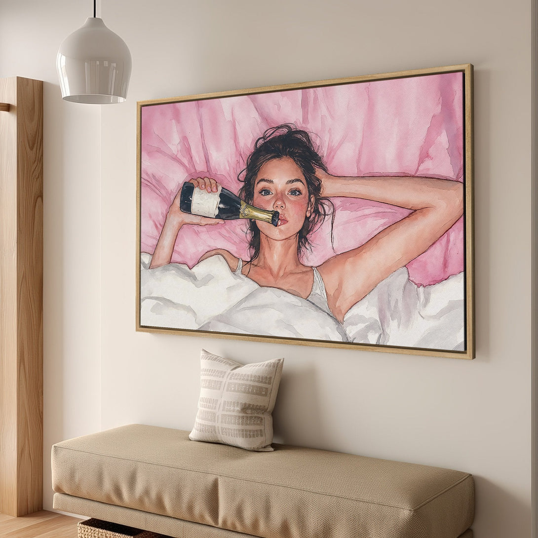 Framed Wall Art: Watercolor painting of a woman in bed with champagne. Soft pink and neutral tones. Add a touch of luxury to your space!