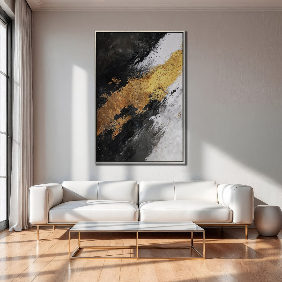 Abstract Canvas Print in a modern interior. Features black, white, and gold brushstrokes. Perfect for adding a touch of luxury to your space.