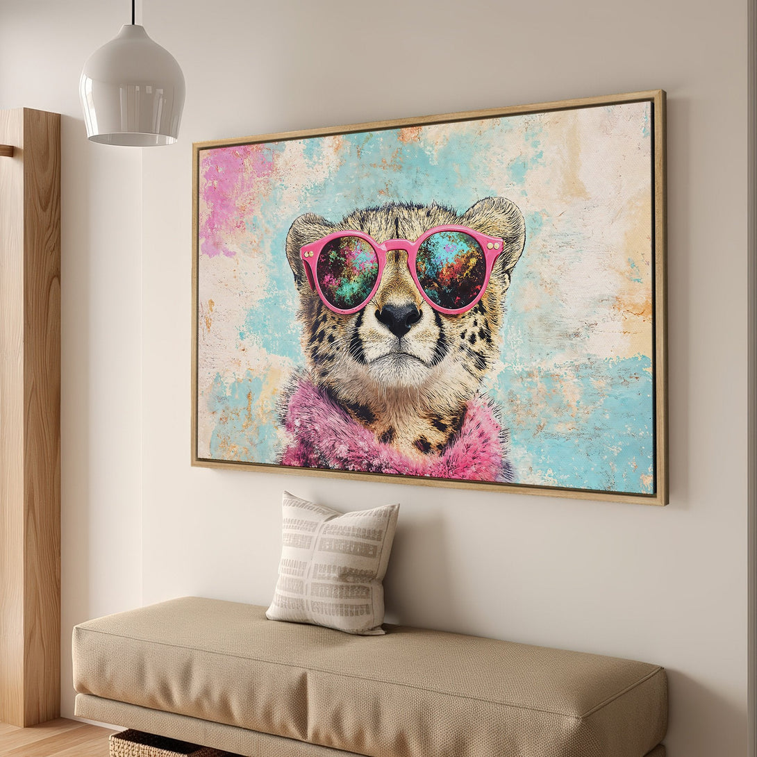 Framed Wall Art featuring a cheetah in sunglasses, vibrant pop art style with pink, blue, and neutral tones. Perfect for adding personality to any space.