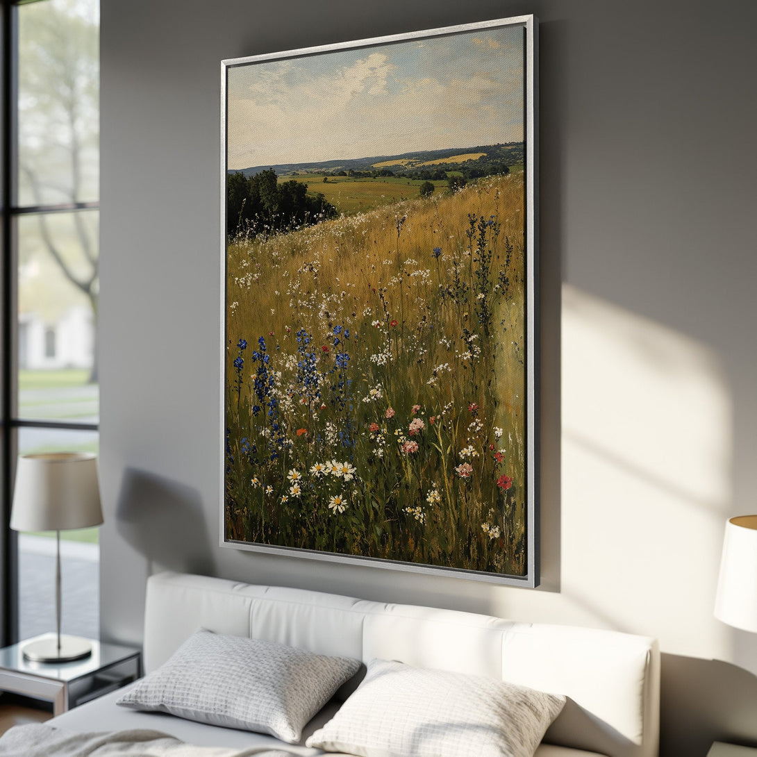 Framed Wall Art: Landscape Canvas Print with wildflowers in a field. Warm color palette with blues, greens, and golds. Perfect for adding a touch of nature to your home.