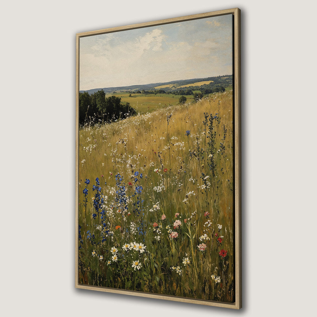 Framed Wall Art: Impressionist landscape Canvas Print with wildflowers in a field. Earthy tones of green, gold, and blue create a serene, natural aesthetic.