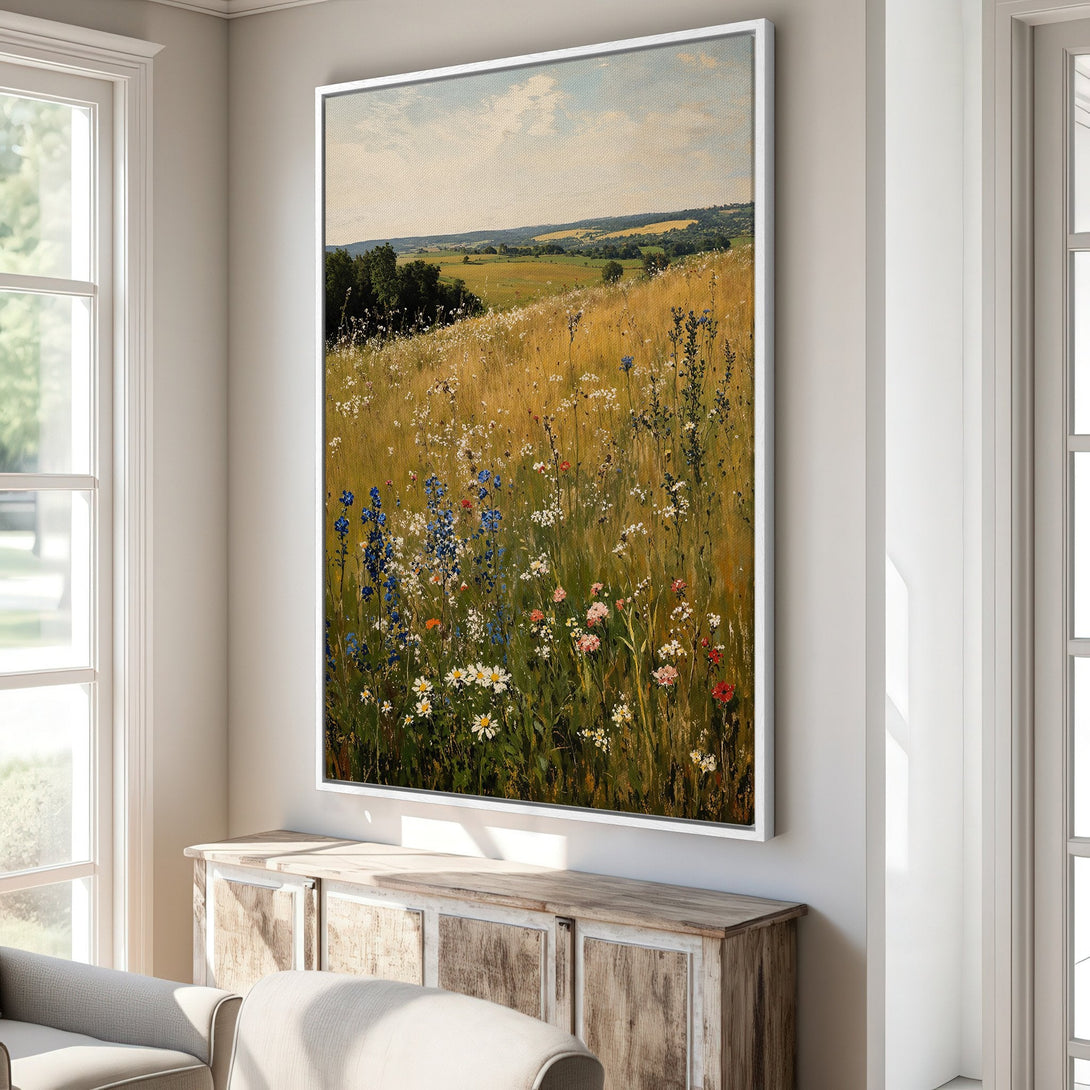 Framed Wall Art featuring a serene landscape painting with wildflowers. Earthy tones and a touch of blue create a calming, artistic vibe for any room.