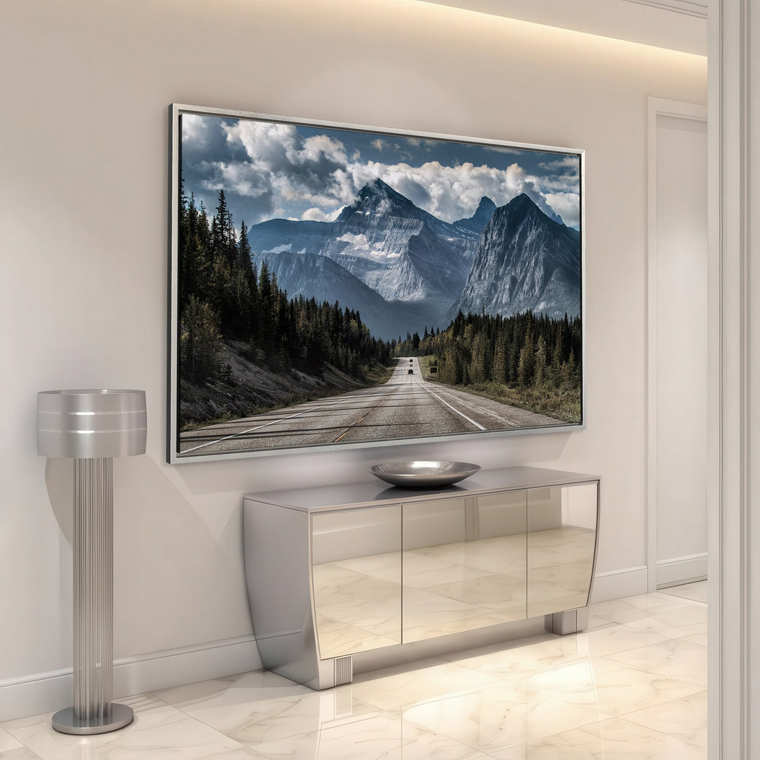 Framed Wall Art: Stunning mountain landscape Canvas Print in cool blues and greens, adding a touch of nature to any modern interior.