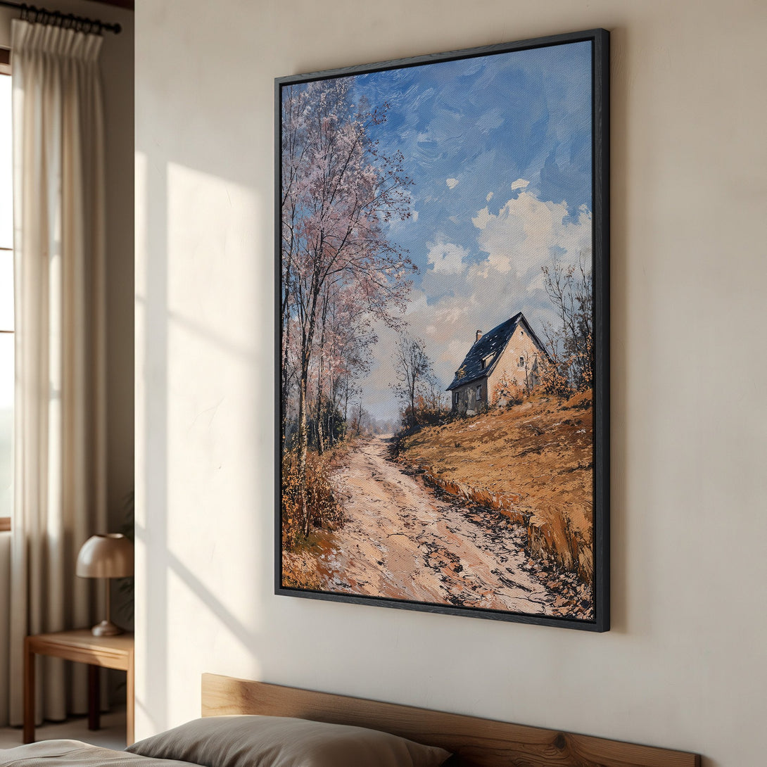 Framed Wall Art: Landscape painting of a country road and cottage. Warm earth tones with blue sky, impressionist style. Perfect for living room decor.