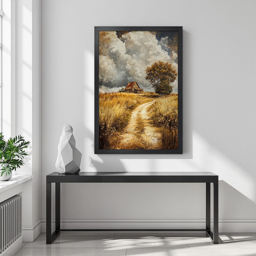 Framed Poster of a rustic landscape with a barn and road, warm earth tones and dramatic sky. Perfect for home decor.