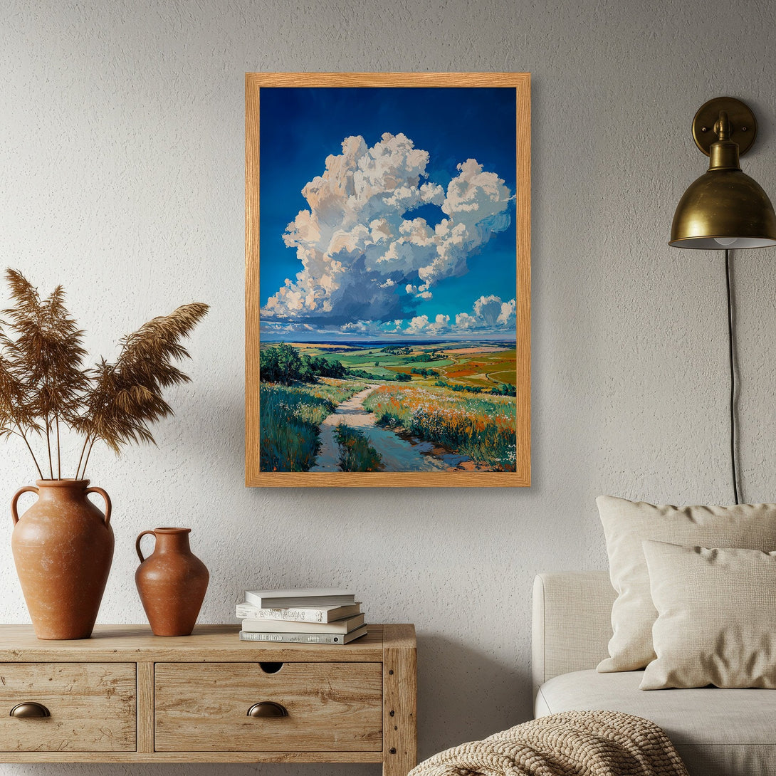 Framed Poster of a vibrant landscape painting with a blue sky and fluffy clouds. Perfect for adding a touch of nature to your home decor!