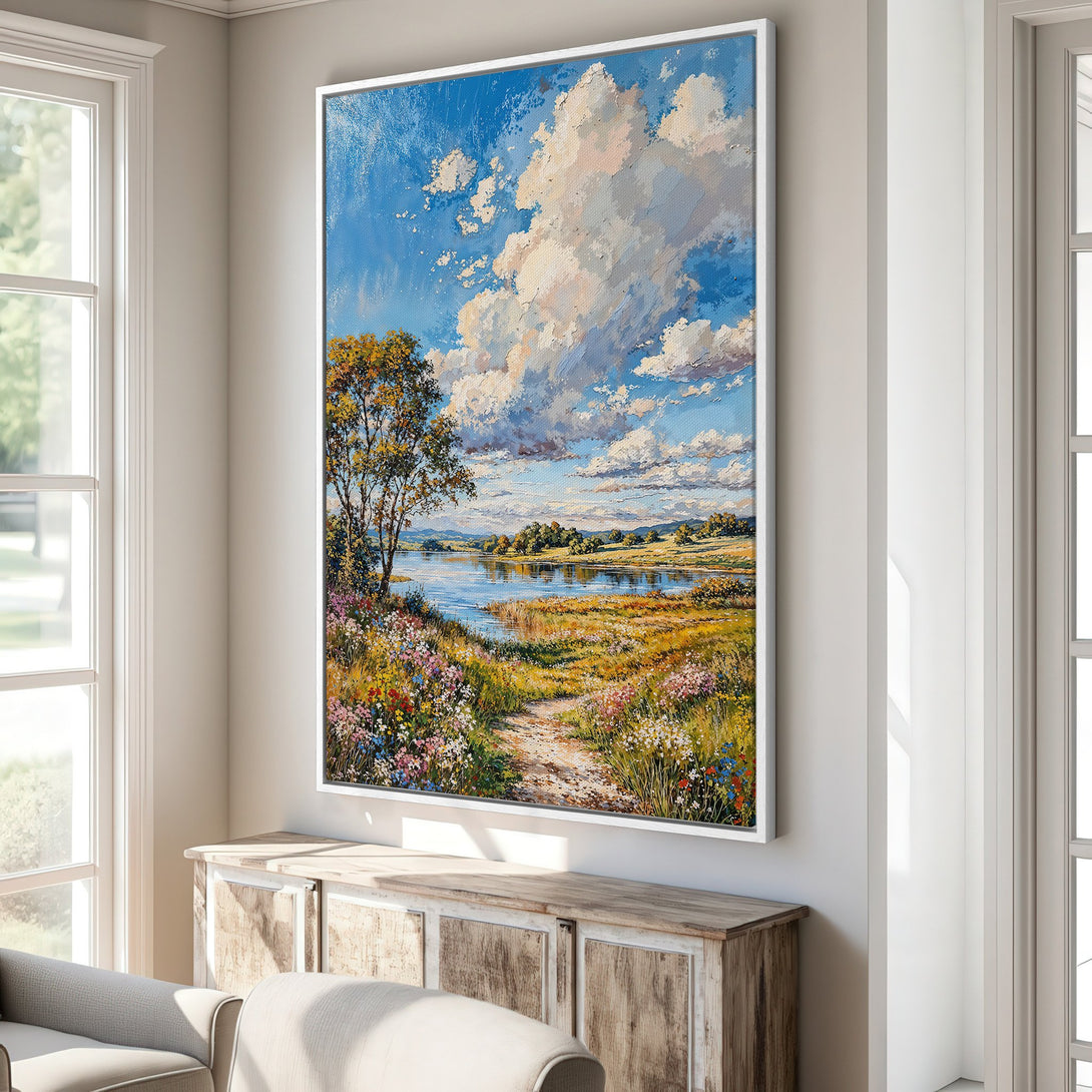 Framed Wall Art: Landscape painting with a vibrant blue sky, fluffy clouds, and a colorful meadow. Adds a touch of nature and warmth to any interior.