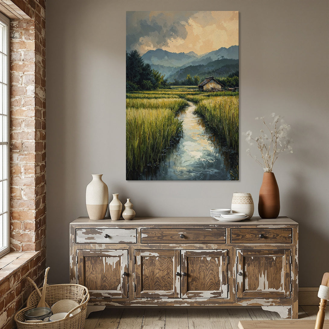 Framed Wall Art: Landscape painting with a serene river scene, featuring a warm color palette of greens, yellows, and blues. Perfect for home decor.