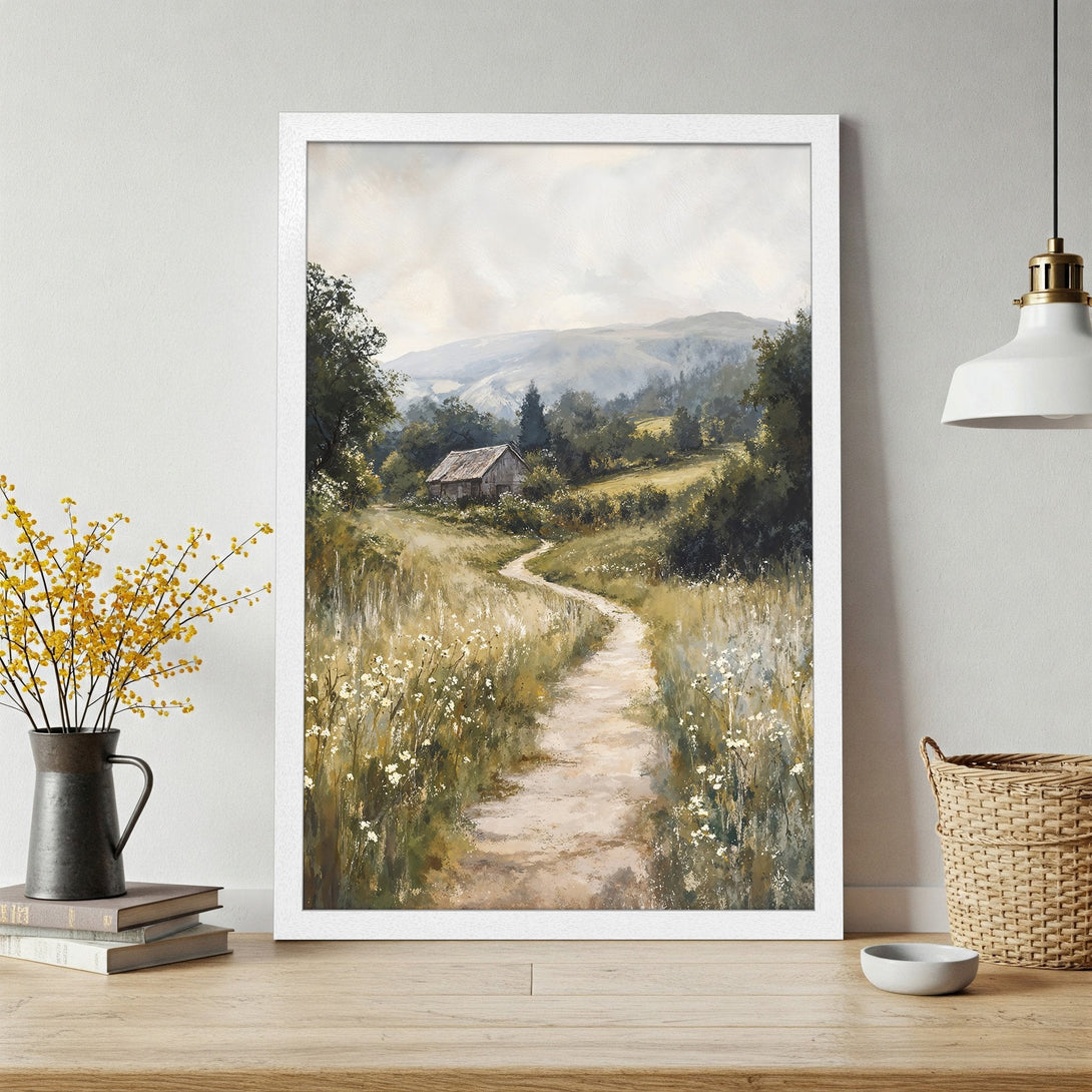 Framed Poster featuring a serene landscape painting with a path leading to a cabin. Soft, muted colors create a calming, rustic style.